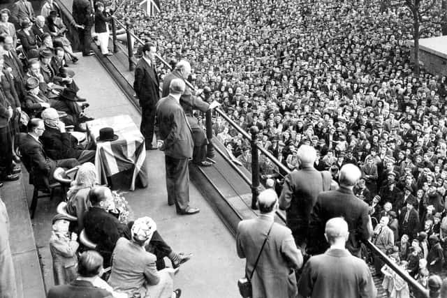 Prime Minister Winston Churchill addresses a crowd gathered on Prestons Flag Market from the steps of the Harris Library on June 27, 1945