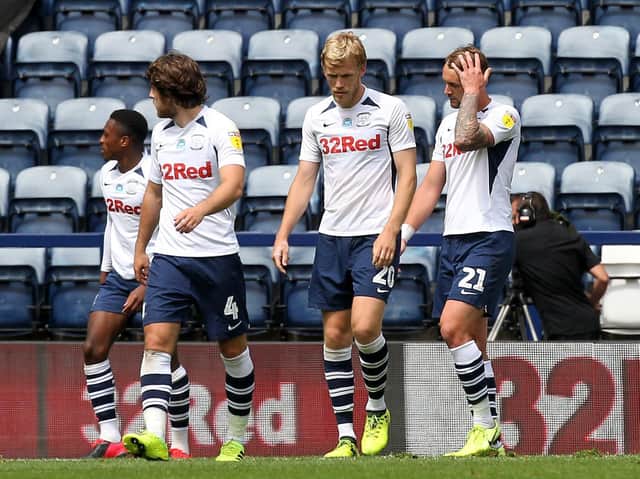 Preston players look dejected after loss to Cardiff