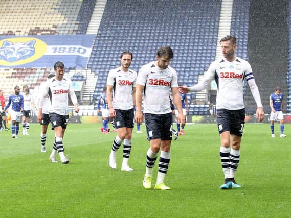Preston North End leave the field after their defeat.