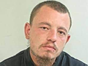 Sean Fisher (pictured)is wanted by police in connection with an arson investigation in Chorley. (Credit: Lancashire Police)