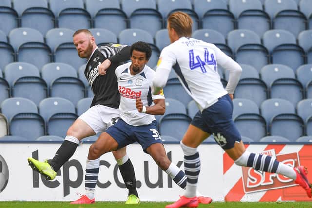 Derby’s Wayne Rooney and PNE’s Scott Sinclair during Wednesday’s night’s game