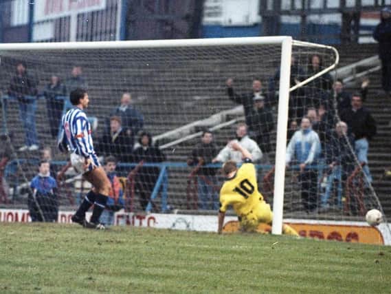 Graham Shaw scores Preston's opening goal in a 2-1 win over Huddersfield at Leeds Road in February 1992