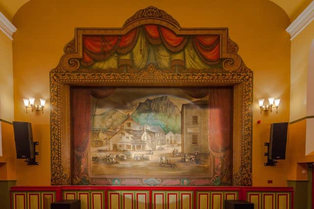 The actdrop that hangs in front of the stage today was painted in 1882 by Operatic Stalwart Edmund Handby, from an 1822 original by George Nicholson.