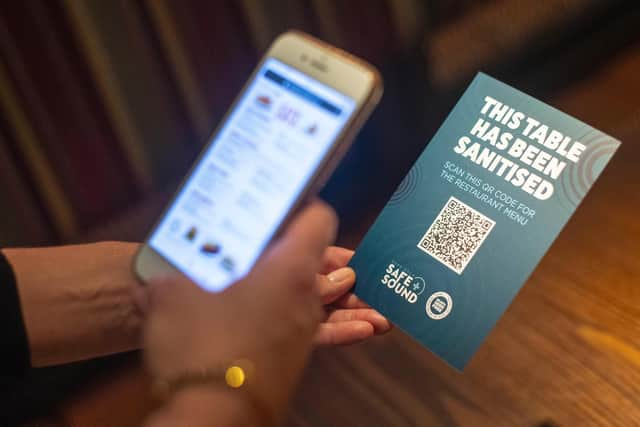 A QR code opens a digital restaurant menu to replace a hard copy