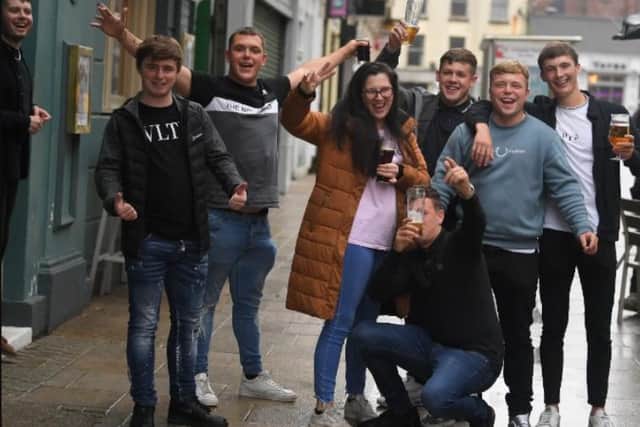 Glad to be back . . . raising a glass outside the Stanley Arms in Preston.