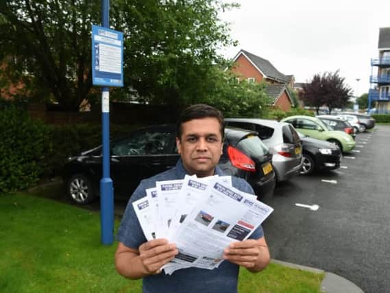 Resident Mayank Soni is refusing to pay his five 100 tickets for parking in front of his home.
