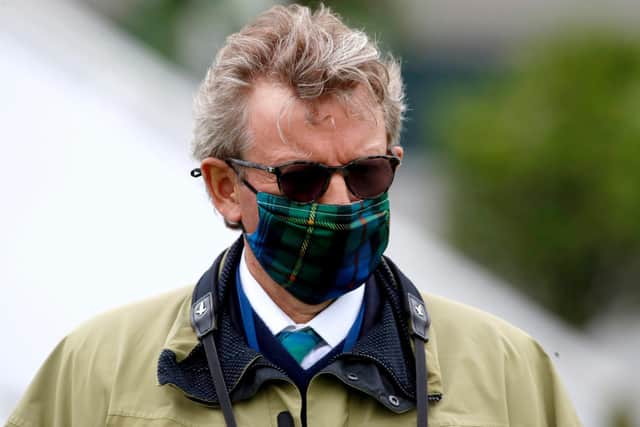 Horse Trainer Mark Johnston wearing a mask at Epsom Racecourse
