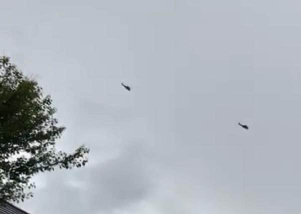 Residents took to social media to share their images and videos of the helicopters. (Photo by Abby Leah Nixon)