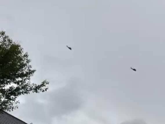 Residents took to social media to share their images and videos of the helicopters. (Photo by Abby Leah Nixon)