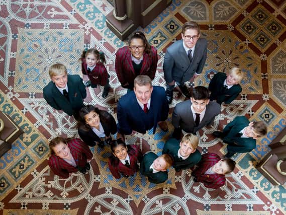Jeff Shaw, headteacher at Scarisbrick Hall School  and co-founder of the The Global Classroom with pupils