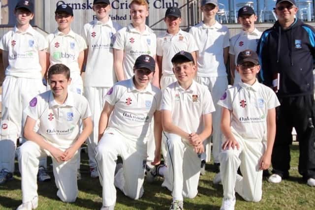 Jonny Tiley, fourth left standing, with his Mawdesley Cricket Club team mates