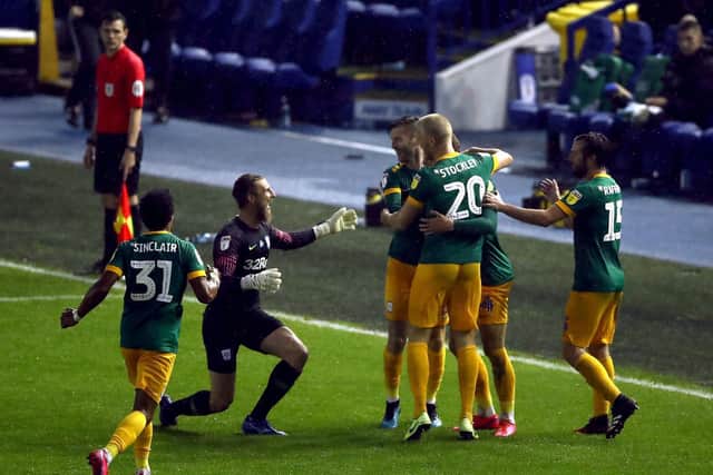 Preston North End's players celebrate Brad Potts' third goal at Sheffield Wednesday