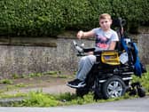 Jack Sowden has problems navigating the pavements in Morecambe and would like them improving. Photo: Kelvin Stuttard