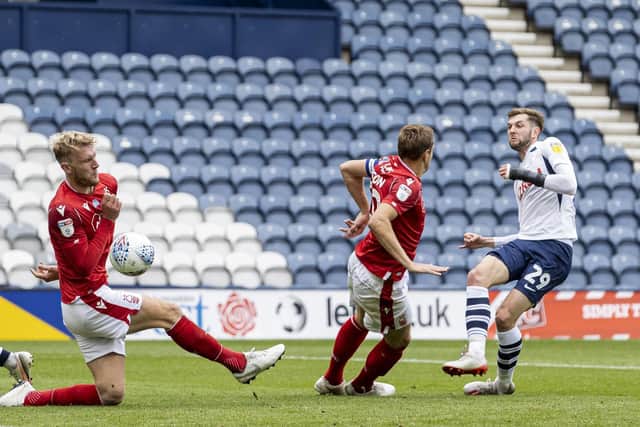 Tom Barkhuizen sees his shot blocked by Joe Worrall