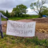 A Longridge Environment Group protestor at the development site