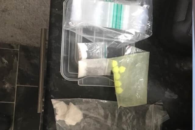 Class A drugs and more than 8,000 in cash has been seized after police raided six homes in Chorley and South Ribble recently. Pic: Lancashire Police