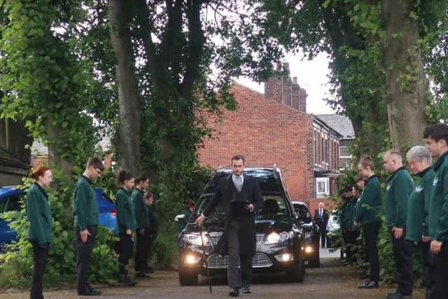 Members of Chorley's Angels form a guard of honour at the funeral