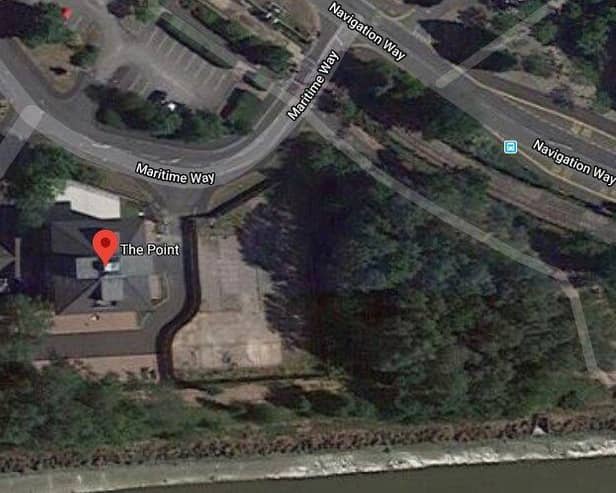 The apartment block will be built on land next to The Point, an existing residential development (image: Google)