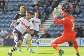 Preston striker Sean Maguire scores against Brentford at Deepdale last September