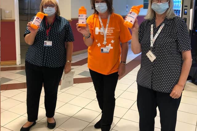 Hospital staff showing off their new water bottles (Picture: Lancashire Teaching Hospitals NHS Foundation Trust)