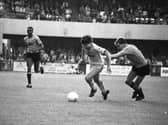 Preston striker Tony Ellis takes on a Brentford defender at Griffin Park in October 1988