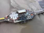 Photos show that a ride was completely burnt out, and there was serious damage to a workshop on the pier.