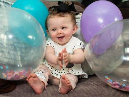 Romany Hopkins celebrating her first birthday. Photo: Kelvin Stuttard.