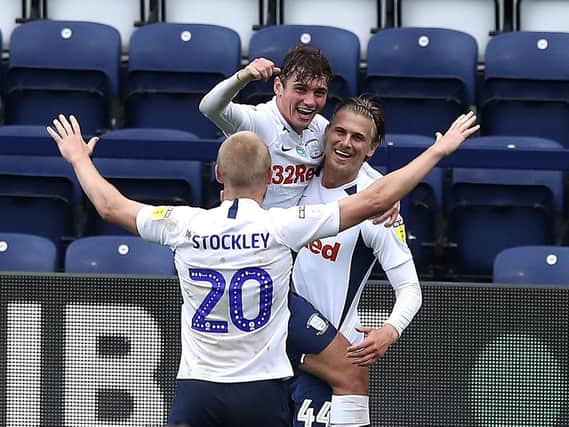 Brad Potts is congratulated by Ryan Ledson and Jayden Stockley after scoring Preston's second goal against Birmingham at Deepdale