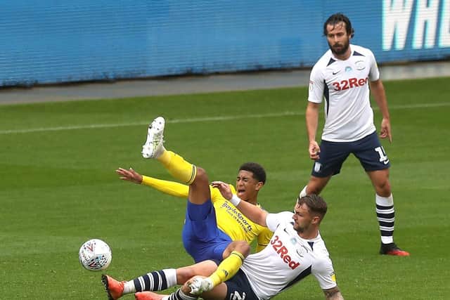 PNE centre-half Patrick Bauer tackles Birmingham midfielder Jude Bellingham