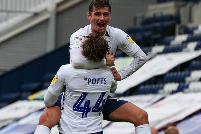 Brad Potts celebrates with Ryan Ledson after scoring Preston’s second goal against Birmingham at Deepdale