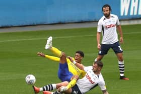Preston defender Patrick Bauer tackles Birmingham's Jude Bellingham at Deepdale on Saturday