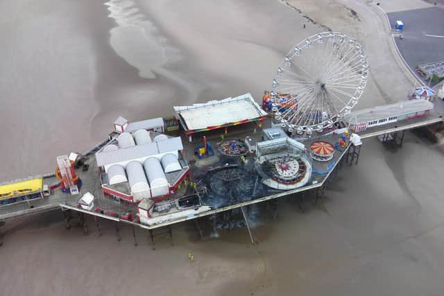 The damage done to the waltzers ride and workshop on Central Pier