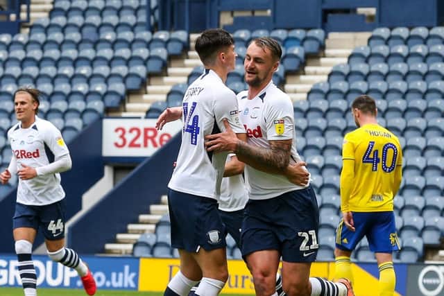 Patrick Bauer is congratulated by Jordan Storey after giving Preston the lead against Birmingham City at Deepdale