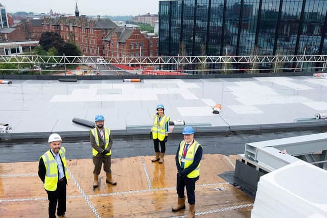 Atop  the student centre at the recent topping off ceremony