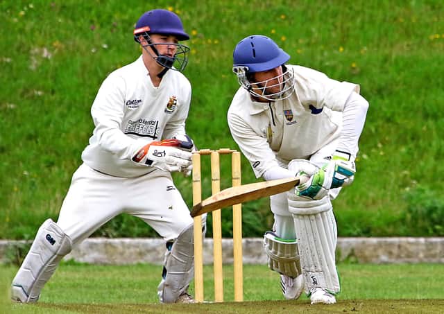 Laurie Atkinson plays the ball into the legside