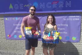 Age Concern Central Lancashire volunteers, Kieran Henshaw and Rosie Munro