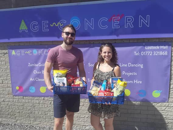 Age Concern Central Lancashire volunteers, Kieran Henshaw and Rosie Munro