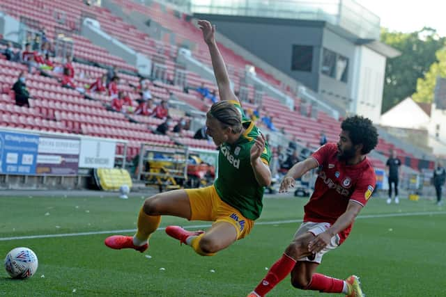 Preston midfielder Brad Potts is challenged by Bristol City wing-back Jay Dasilva