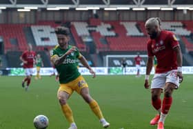 Preston striker Sean Maguire takes on Bristol City's Ashley Williams