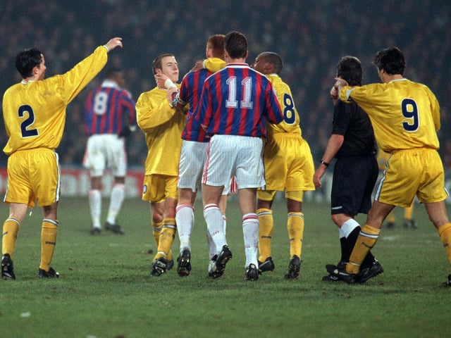 Tempers boil over as Lee Bowyer and Crystal Palace captain David Hopkin need to be restrained by teammates during a FA Cup clash at Selhurst Park.