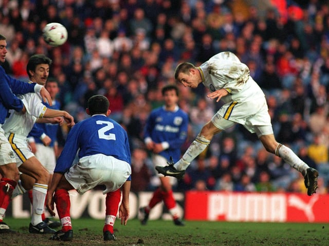 Lee Bowyer heads home his second goal against Pompey in an FA Cup clash at Elland Road.