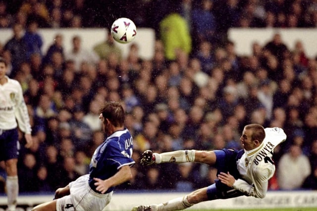 Lee Bowyer of Leeds United shoots past Everton's Richard Gough at Goodison Park. The Whites and the Toffees shared eight goals that day.