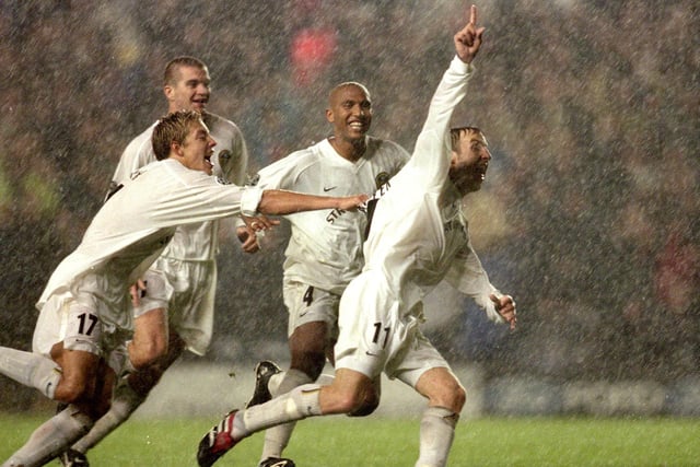 Lee Bowyer scores a last gasp Champions League winner against AC Milan in the pouring rain at Elland Road.