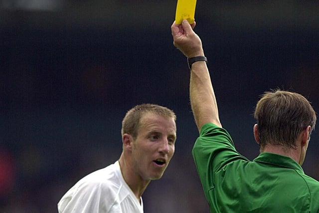 Lee Bowyer is booked on the opening day of the season against Southampton at Elland Road. He scored as Leeds beat the Saints 2-0.