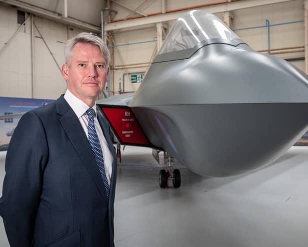 BAE Systems CEO Charles Woodburn wiht the full-sized mock-up of the Tempest which could provide work for engineers in Lancashire for years to come