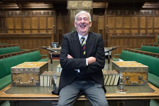 House of Commons Speaker Sir Lindsay Hoyle posses for a photograph in the chamber of the House of Commons in the Palace of Westminster London