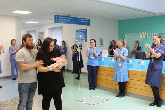 The family are clapped out of hospital after a traumatic month-long stay. Picture courtesy of Blackpool Victoria Hospital