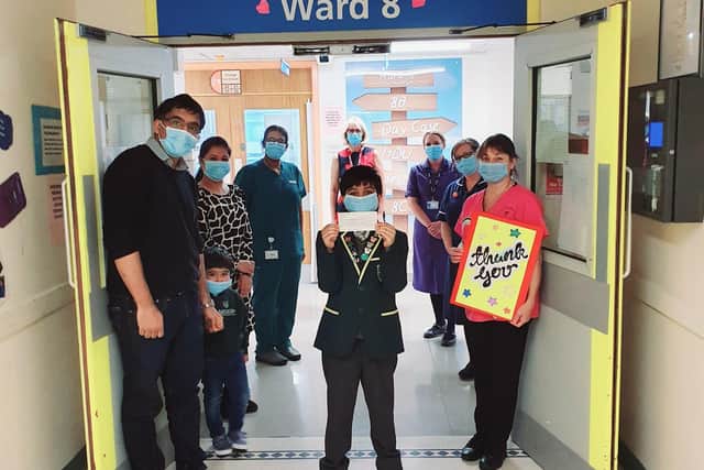 Soically distanced photocall for talented Ahaan at the hospital
