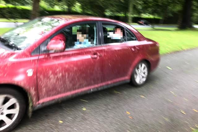 One man said he was nearly knocked down by the car as it sped along the footpath in Moor Park yesterday (July 27)