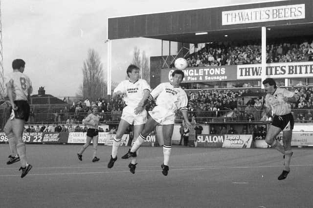 Preston's Nigel Greenwood and Warren Joyce both go up for a header in the home defeat to Bristol Rovers in February 1990